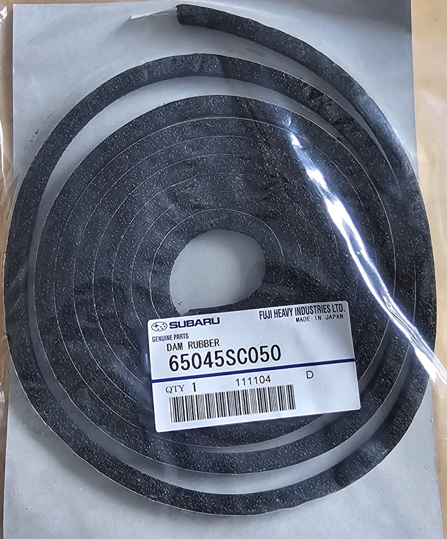 DAM RUBBER -  